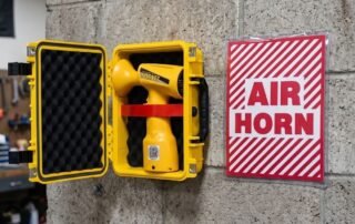 Emergency-Station-Kit-WoodsCan-Hornet-Rechargeable-Air-Horn-2026-on-wall